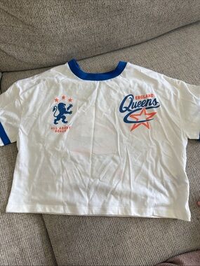 Mango White Tee with Blue Collar and Orange Graphic